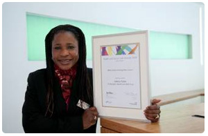 Adeola Talabi with her London Health and Social Care Awards 2009 Unsung Hero award certificate