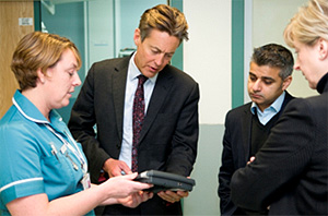 Left to right: Matron Nicola Shopland demonstrates the PET to Ben Bradshaw, Sadiq Khan and Dr Geraldine Walters, Director of Nursing and Patient Involvement.