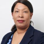 Arlene with a navy jacket