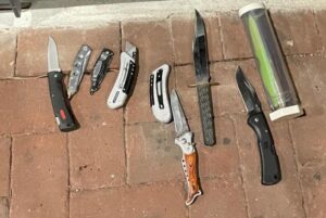knives laid out on the ground