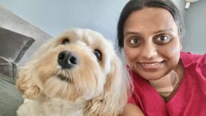 Manju at home after being in hospital with her dog Reacher