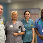 James with three colleagues