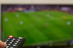 A remote control with a tv